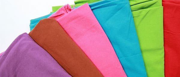 Lưu ý khi lựa chọn vải may áo đồng phục